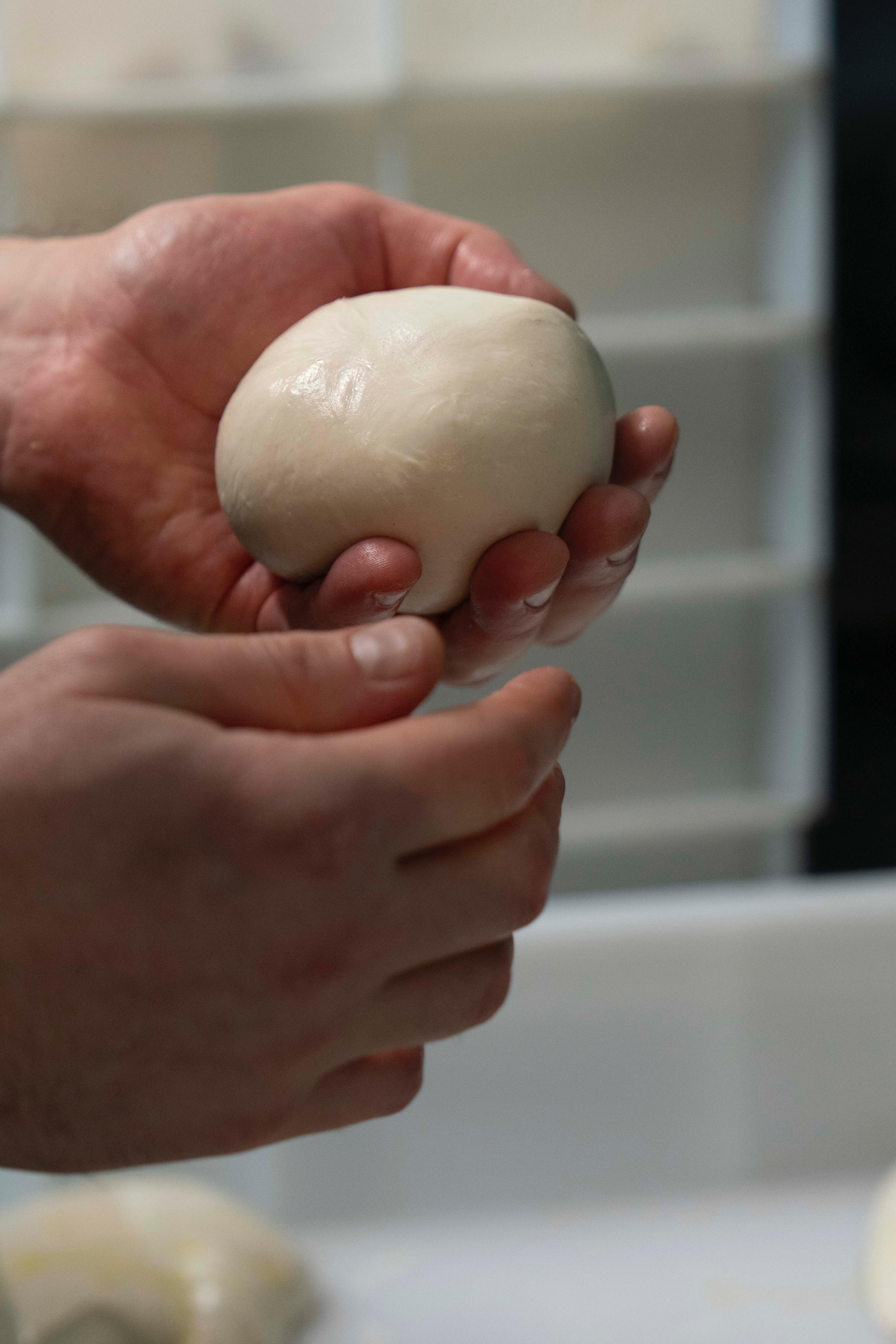 Shaping dough by hand at Kalura, Antwerp