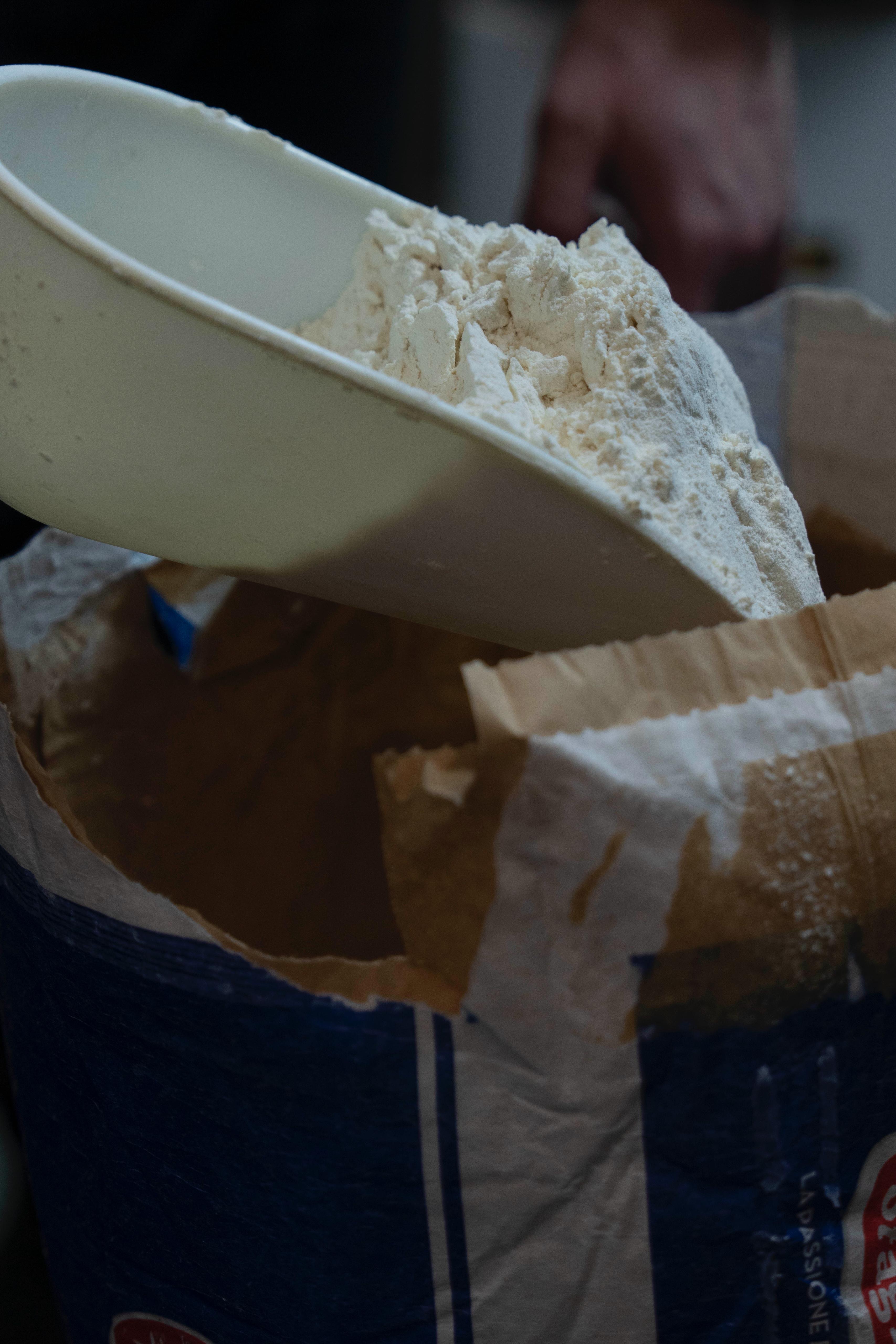 Scooping Italian flour at Kalura, Antwerp