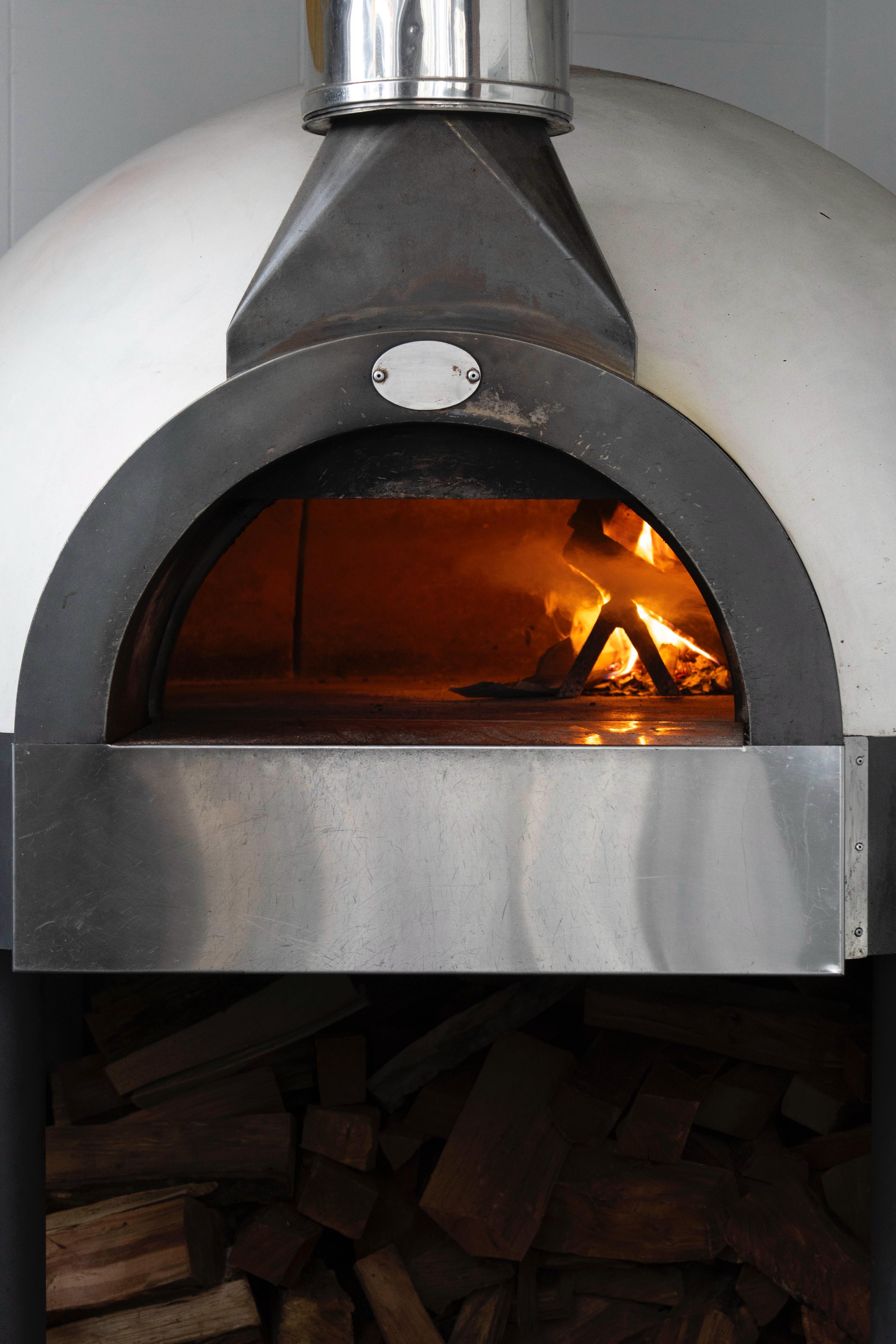 Wood-fired oven full view at Kalura, Antwerp