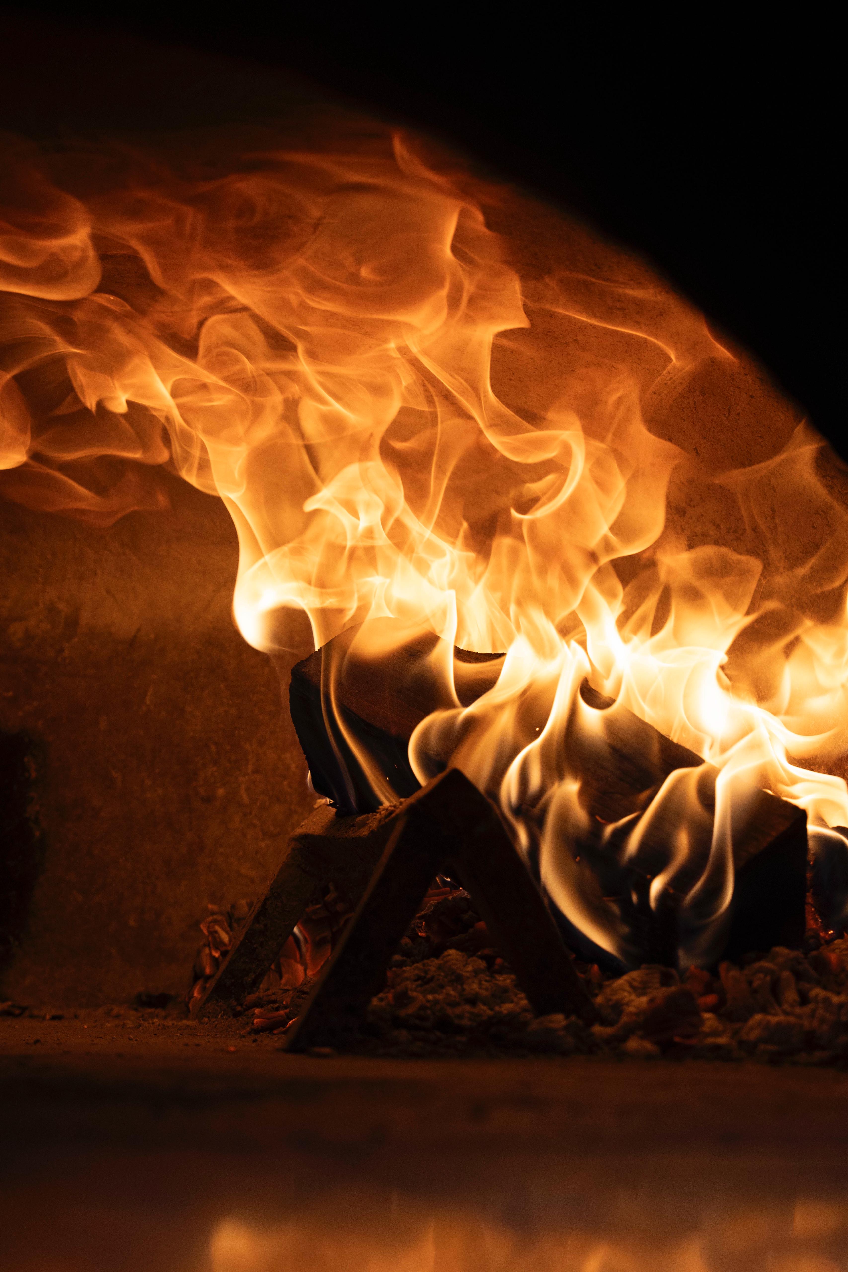 Flames in the wood-fired oven at Kalura, Antwerp